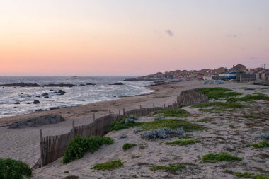 Vila Cha village beach near Porto at sunset, Portugal