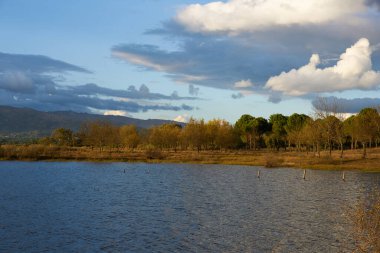 Lake view at sunset with Gardunha mountains on the background at sunset in Castelo Branco, Portugal
