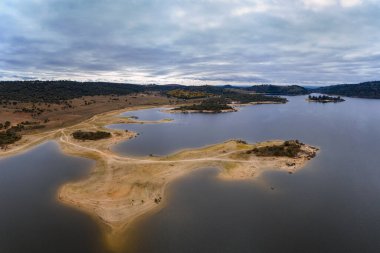 Drone aerial view of Idanha Dam Marechal Carmona landscape with beautiful blue lake water, in Portugal