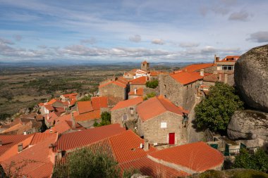 Monsanto historic village with stone boulder buildings and rooftops, in Portugal