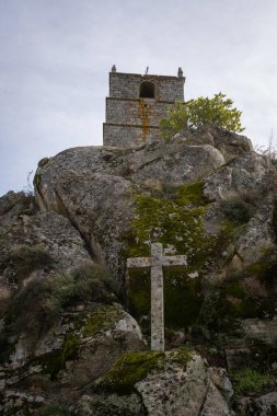 Monsanto historic stone Lucano Tower with clock, in Portugal