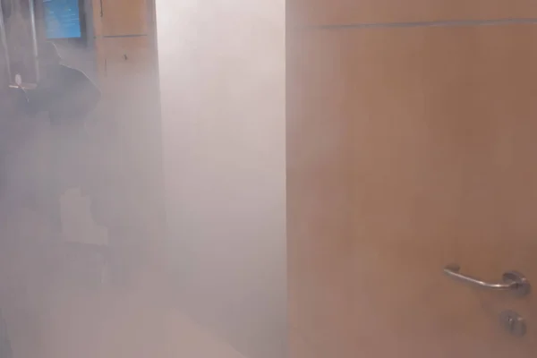 Smog and smoke in the office building - emergency exit
