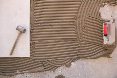 Ceramic tiles and tools for tiler ceramic tiles installation Home improvement, renovation ceramic tile adhesive