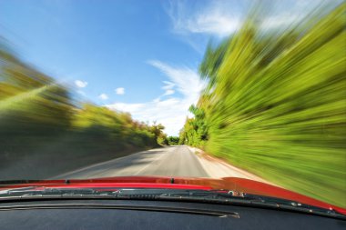 Fast Sport Car Driving in Nature Freeway clipart