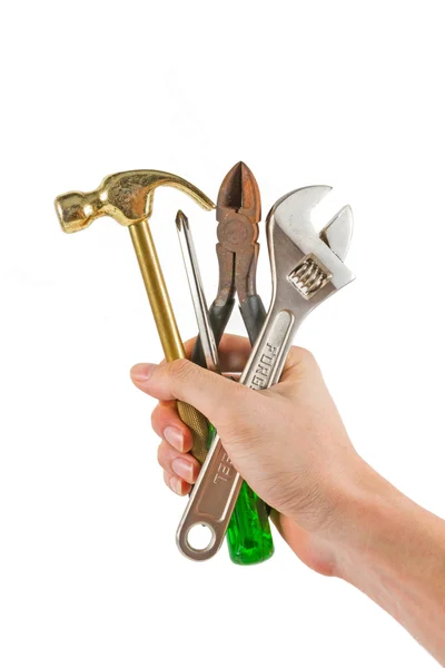 Ręka trzymać zestaw narzędzi — Zdjęcie stockowe