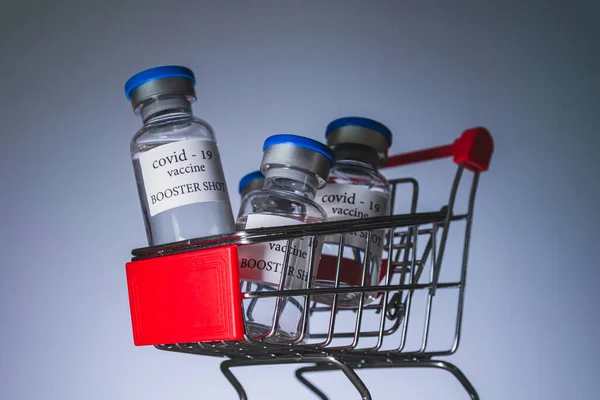 Covid Booster Vaccine Vials Shopping Cart Medicine Health Care Concept — Foto de Stock