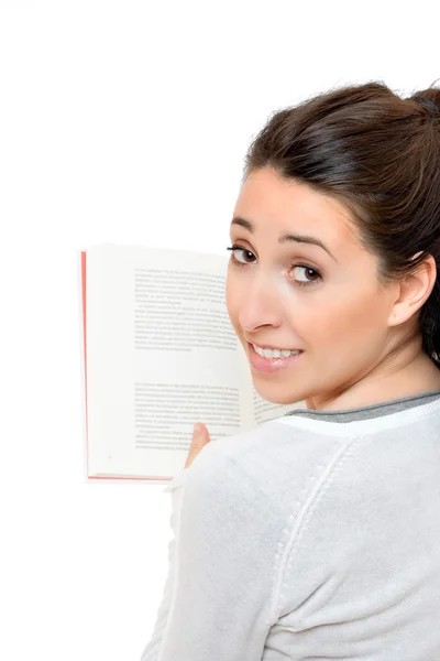 Beautiful woman smiling and reading a book Stock Picture