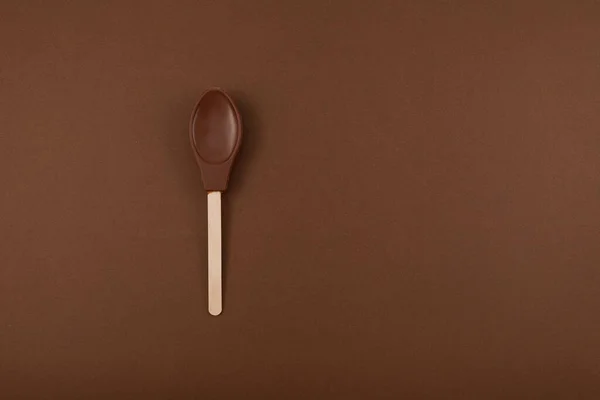 초콜릿 스푼은 배경에 있습니다 디자인 맛있는 쉐이크 숟가락 — 스톡 사진