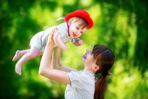 Happy family, mom and little son having fun in the park. Summer — Stock Photo, Image