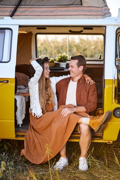 Young Caucasian Couple Sit Outdoors On Van For Travel, Relax, Posing At Camera — Stock Photo, Image