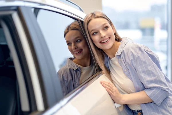 Cheerful Female Hugging New Car Dealership Office Overjoyed Customer Lady — Stockfoto