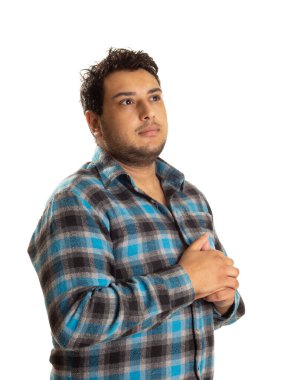 Half profile of Overweight young man looking away.