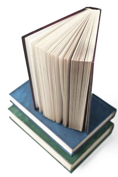 Vários livros sobre um fundo branco — Fotografia de Stock