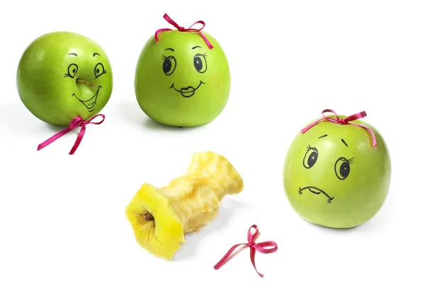 Apples with comically painted faces on a white background — Stock Photo, Image