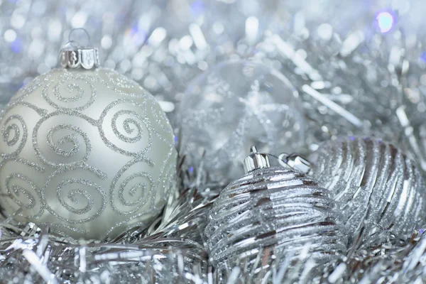 Christmas decorations. New Year ball in tinsel and spangles. Royalty Free Stock Images