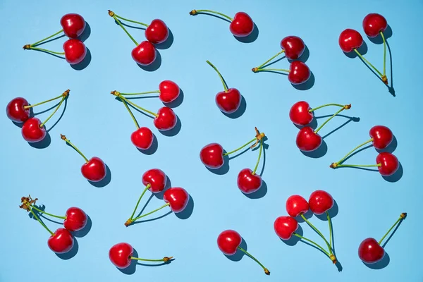 Fresh Ripe Red Cherry Stalks Blue Background Flat Lay — Photo