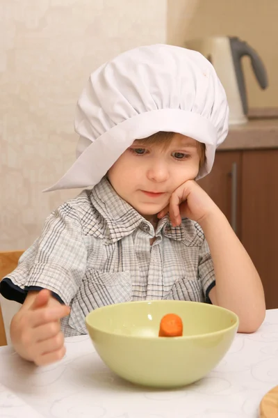 A little boy in сhefs hat — Stock Photo, Image