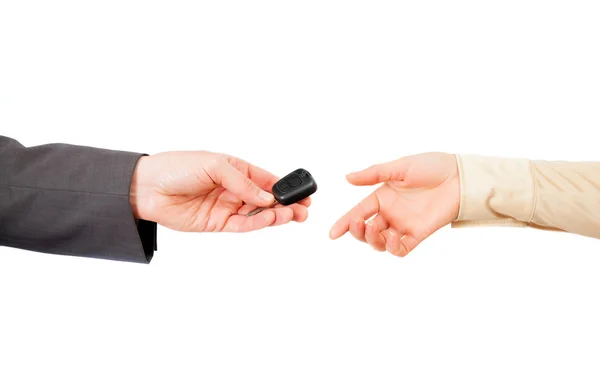 A man and woman hands with car key — Stock Photo, Image