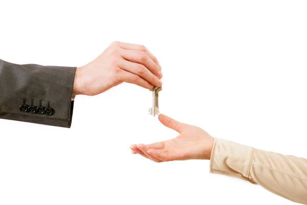 Man and woman hands with flat keys Stock Photo