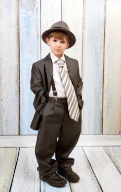 Boy in a big suit clipart