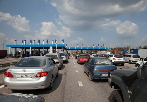 Queue on highway toll gate — Stock Photo, Image