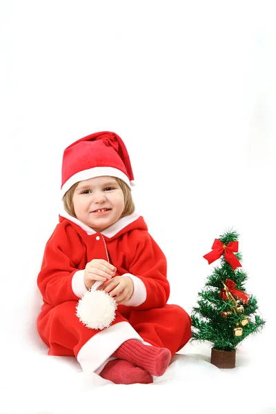Pequeño Santa con un árbol de pelaje —  Fotos de Stock