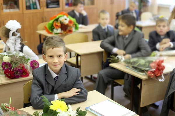 Schoolchilds in classroom on 1 of September — Stock Photo, Image