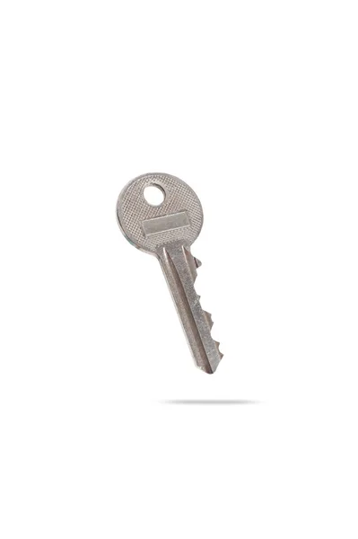 Not new, old metal key from apartment house isolated on white background — Stock Photo, Image
