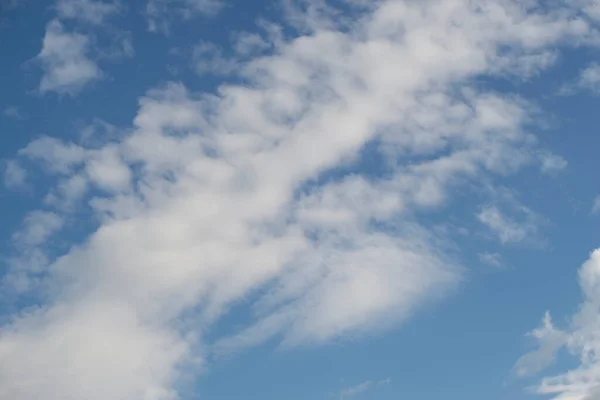 white peaceful sky, white cirrus clouds, beautiful sunny sky, blue sky, yellow lantern, minimalism, building, construction