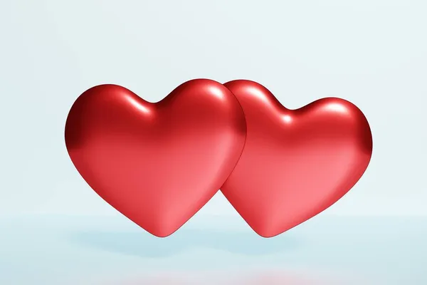 3D рендеринг двух красных сердец на синем фоне — стоковое фото
