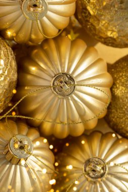 macro detail of beautiful shiny golden Christmas baubles for your festive Christmas project