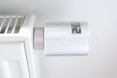 Energy prices crisis concept close up of central heating control showing 24 degrees celsius for your project