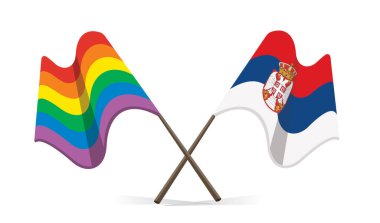 Serbian and lgbt flags waving crossed
