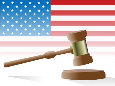 judge's gavel with flag of United States of America in background