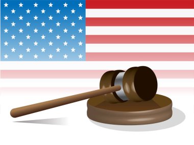 judge's gavel with flag of United States of America in background
