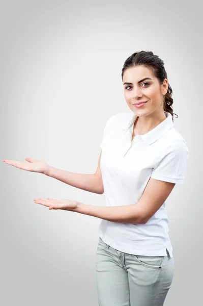 Retrato de la trabajadora mostrando el área en blanco para el signo —  Fotos de Stock