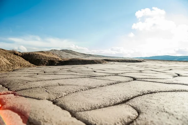 Spectacular dried cracked earth surface at Muddy Volcanoes — Stock Photo, Image
