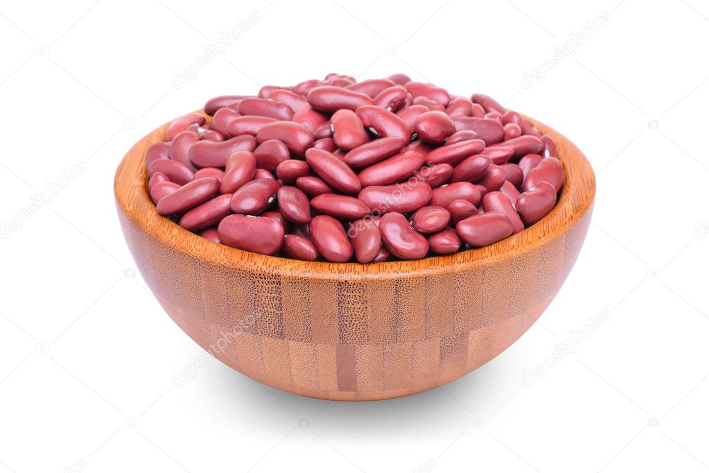 Red beans in wood bowl on white
