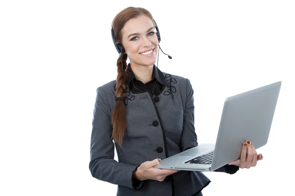 Retrato de un hermoso trabajador de servicio al cliente sosteniendo una computadora portátil Imagen de stock