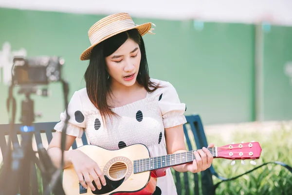 Asian Woman Influencer Playing Guitar Park Make Content Lifestyle Recreation — Stock Fotó