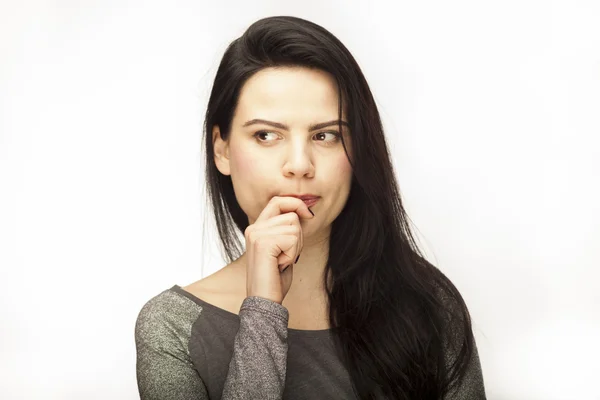 Chica muestra emoción con expresiones faciales — Foto de Stock