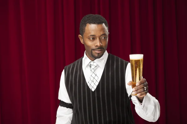 African american bartender in retro suit with beer — Stock Photo, Image