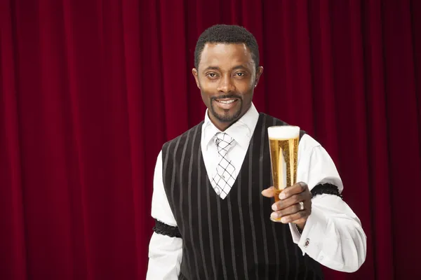 African american bartender in retro suit with beer — Stock Photo, Image