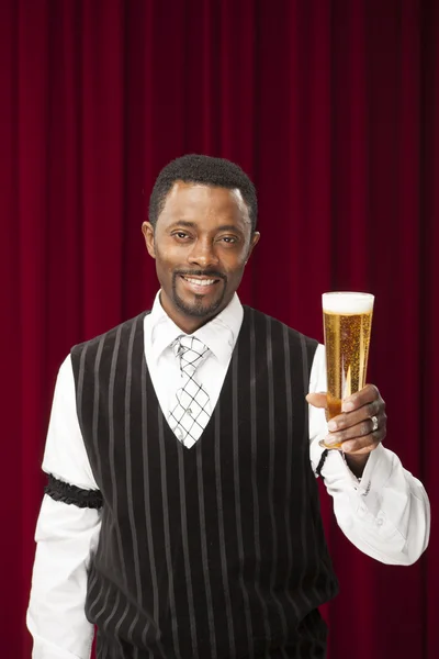 African american bartender in retro suit with beer — Stock Photo, Image