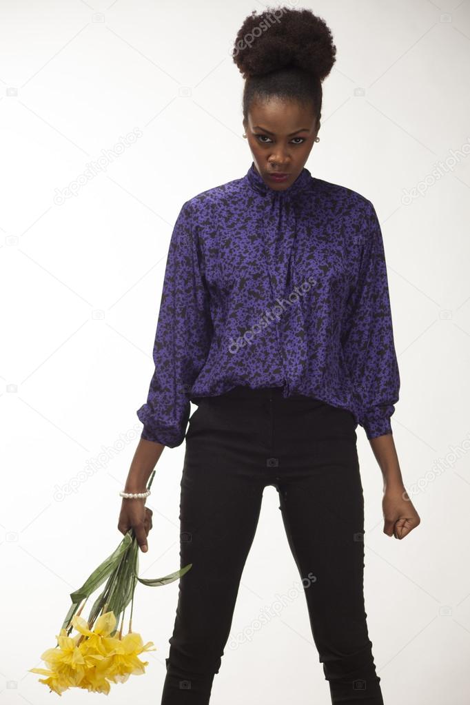angry african american girl with flowers