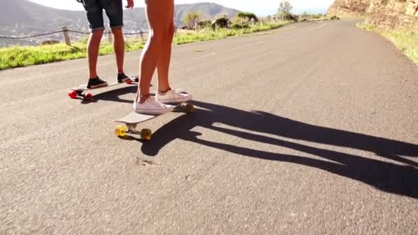 Couple on skateboard — Stock Video