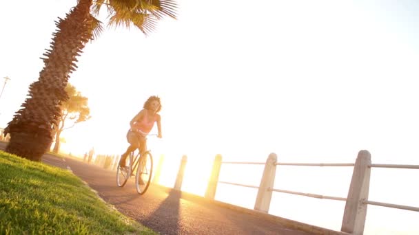 Woman riding a bike — Stock Video