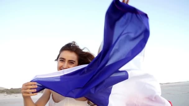 Mujer corriendo con bandera francesa — Vídeos de Stock