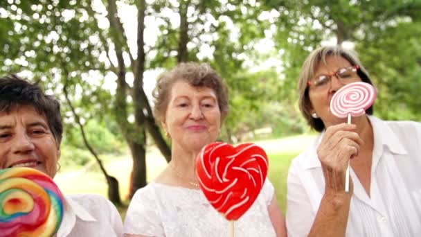 Senior women with lollipops — Stock Video