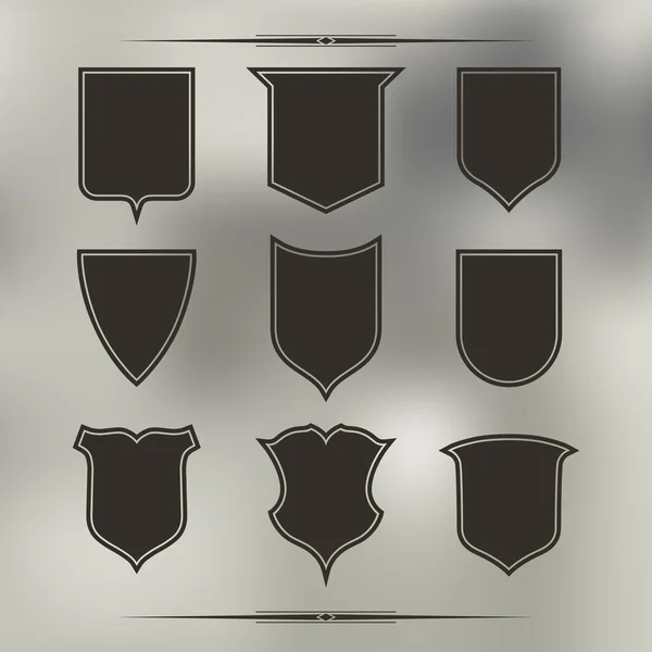 Conjunto de nove formas diferentes de escudos. Preto com contorno — Vetor de Stock